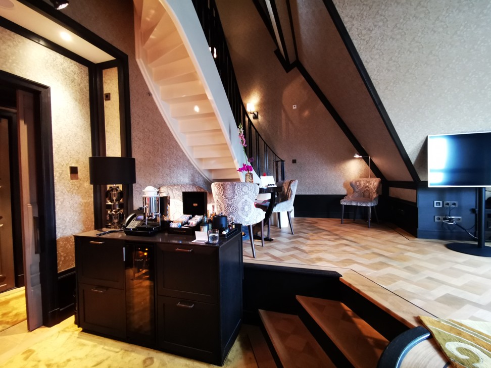 The living room and staircase of Hotel TwentySeven’s two-storey Rooftop Loft Suite. Photo: Winnie Chung