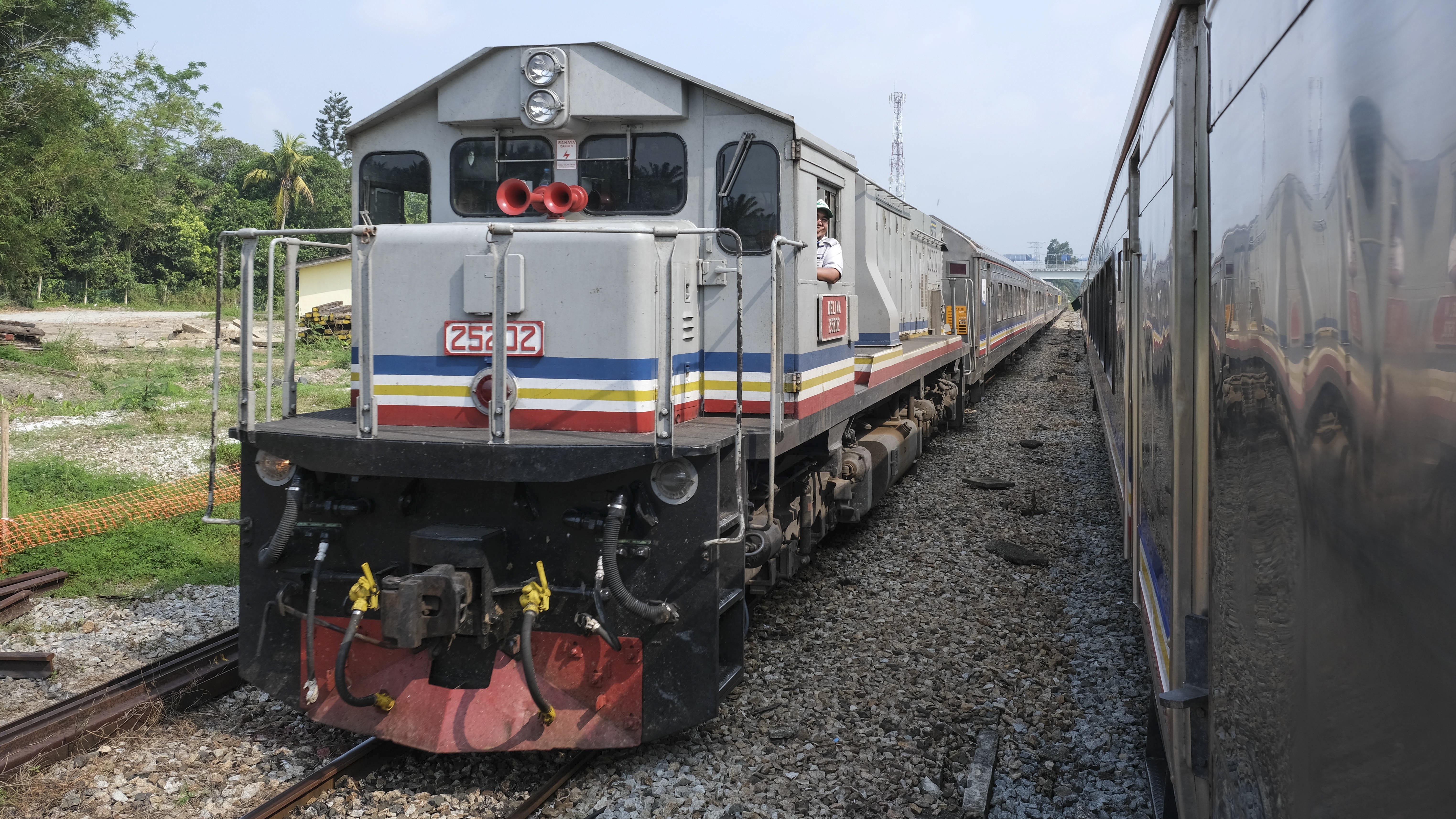 Take a slow train ride through southern Malaysia. Photo: Peter Ford
