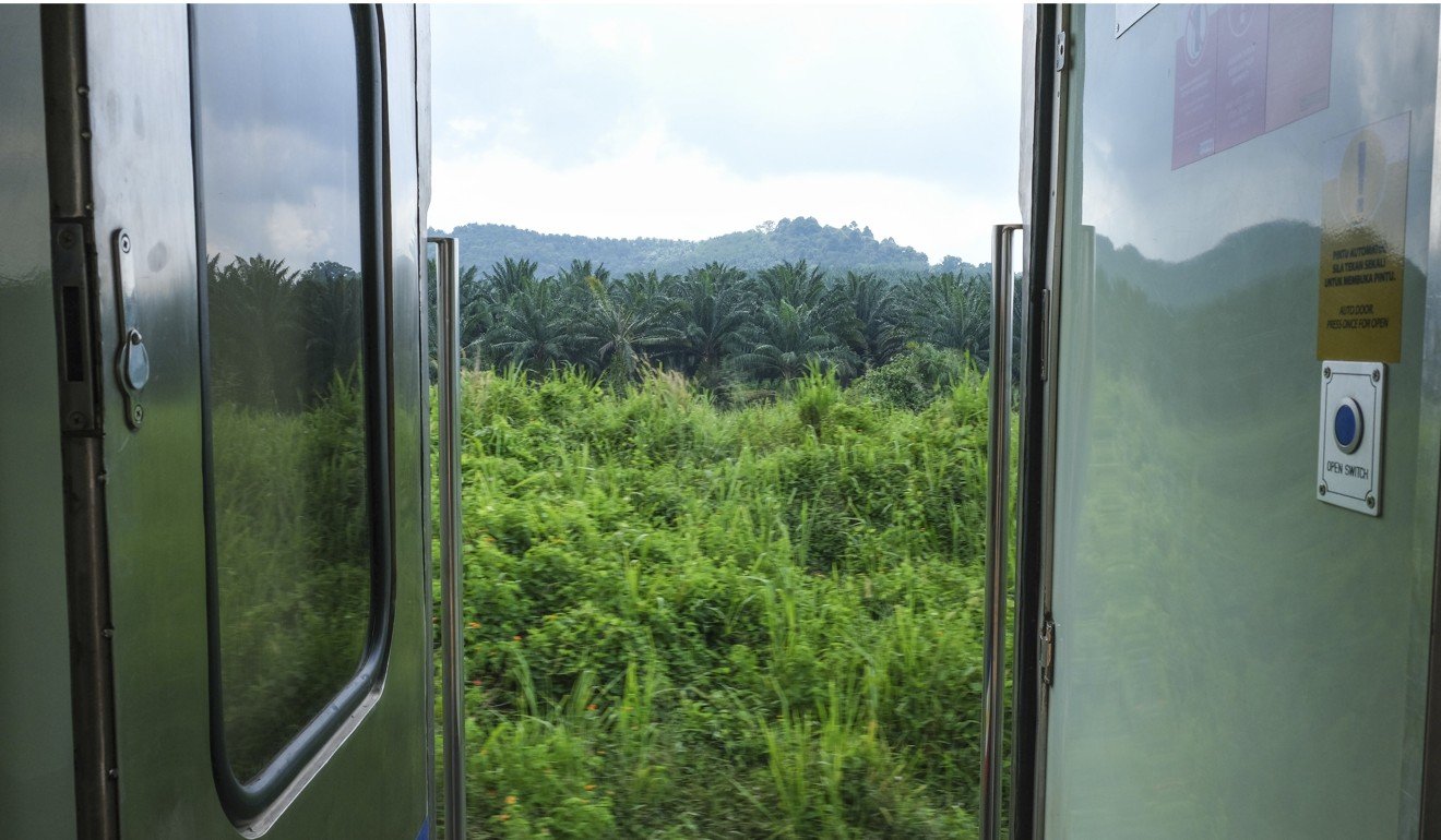 Carriage doors on the old diesel-powered trains can be opened while moving. Photo: Peter Ford