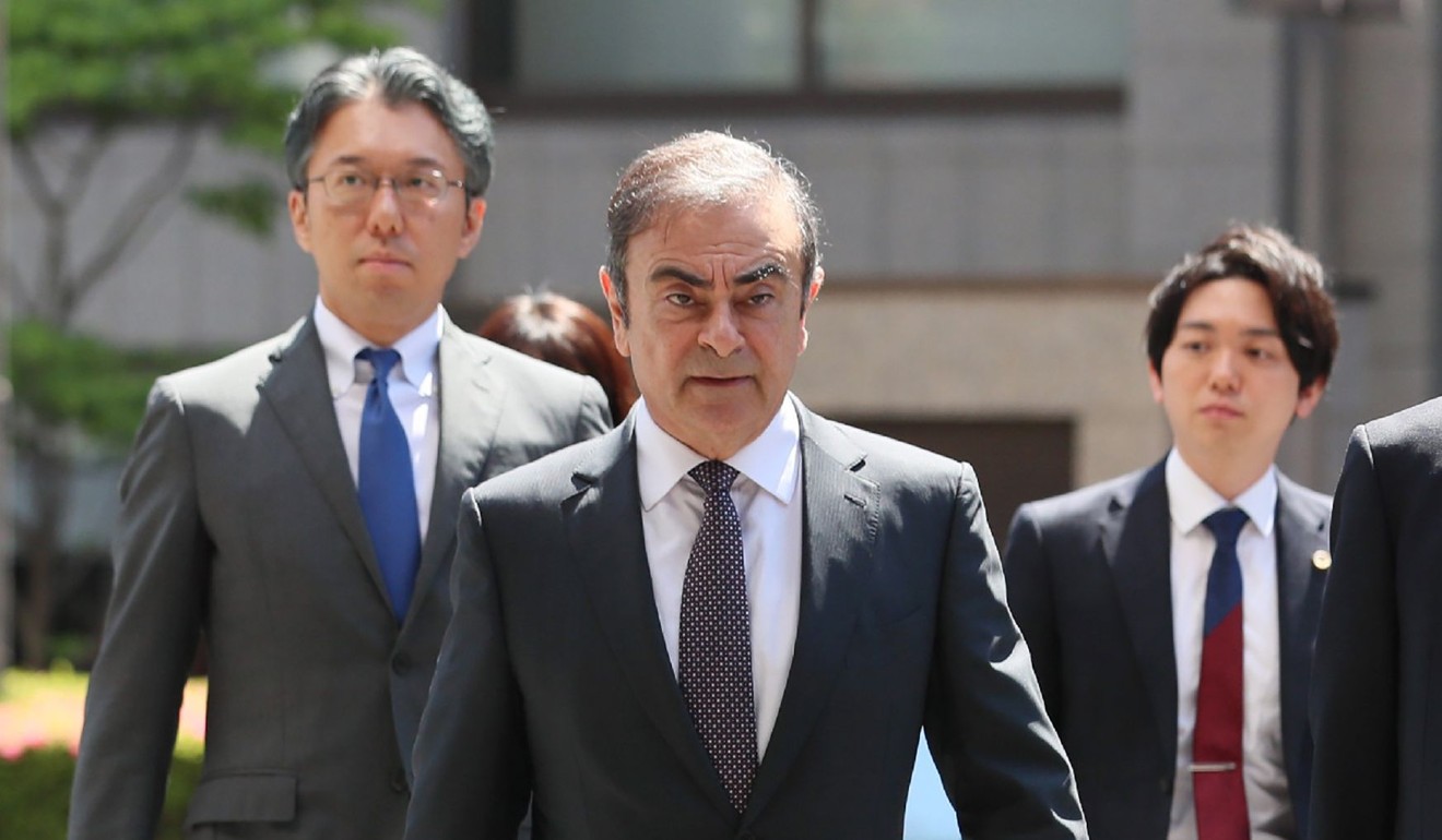 Former Nissan Motor chairman Carlos Ghosn arriving at Tokyo District Court on May 23. Photo: AFP