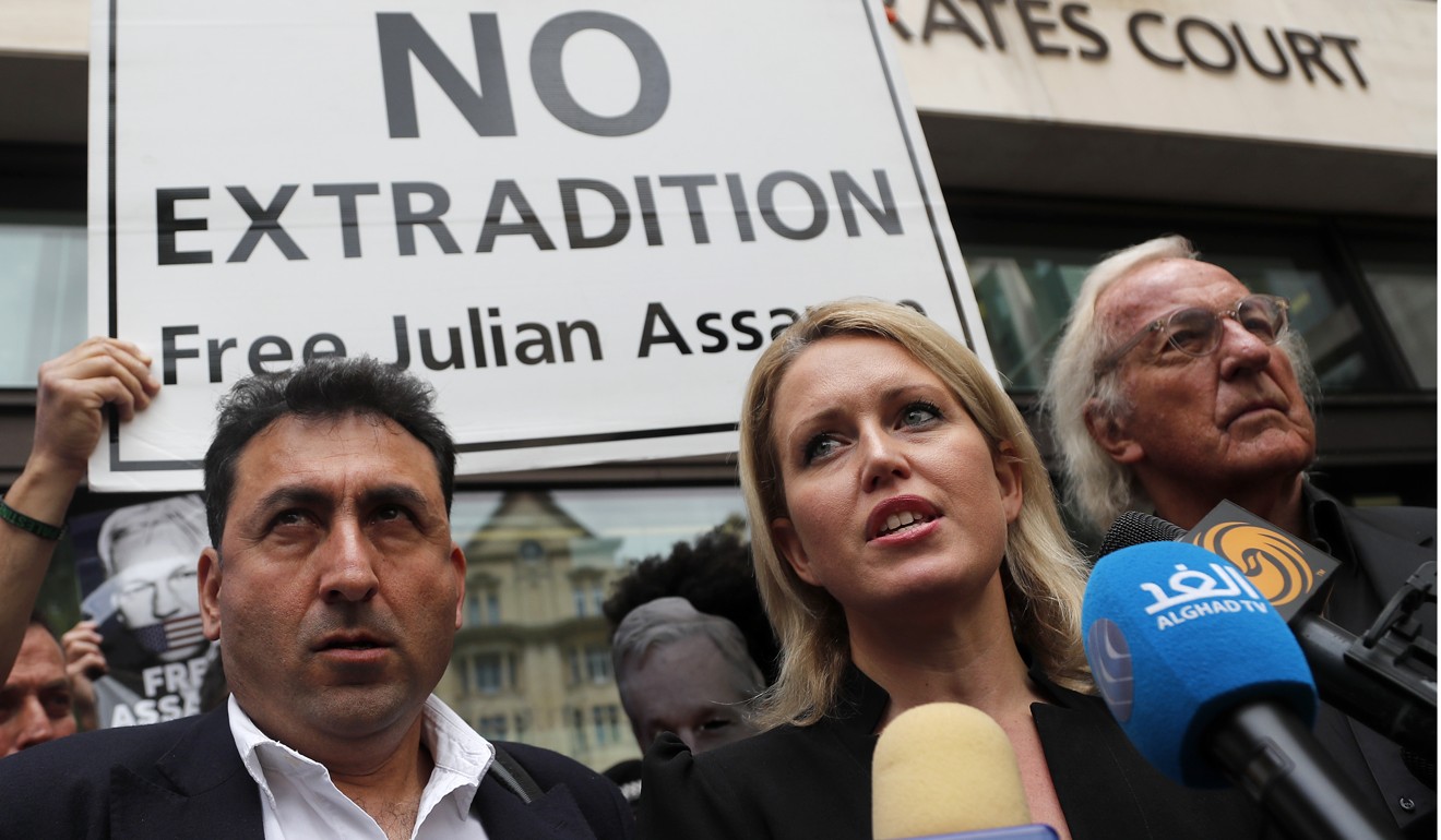 Jennifer Robinson (C), lawyer of Julian Assange, addresses the media in London. Photo: AP
