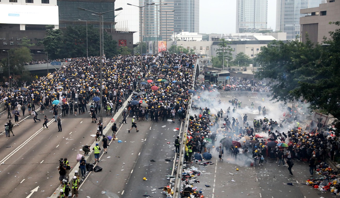 Tear gas is used against demonstrators near the Harcourt Road flyover. Photo: K.Y Cheng