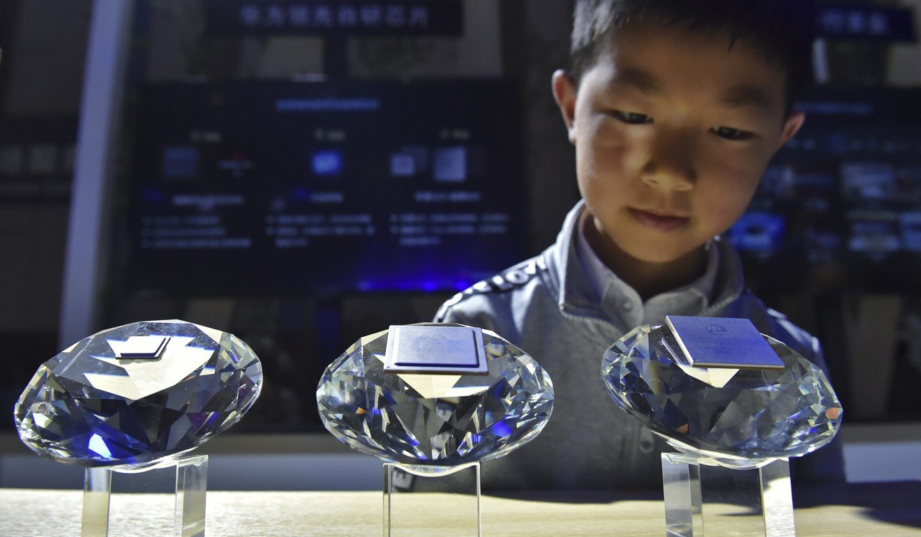 A display of chips designed by Huawei for 5G base stations on show at the China International Big Data Industry Expo. Photo: AP