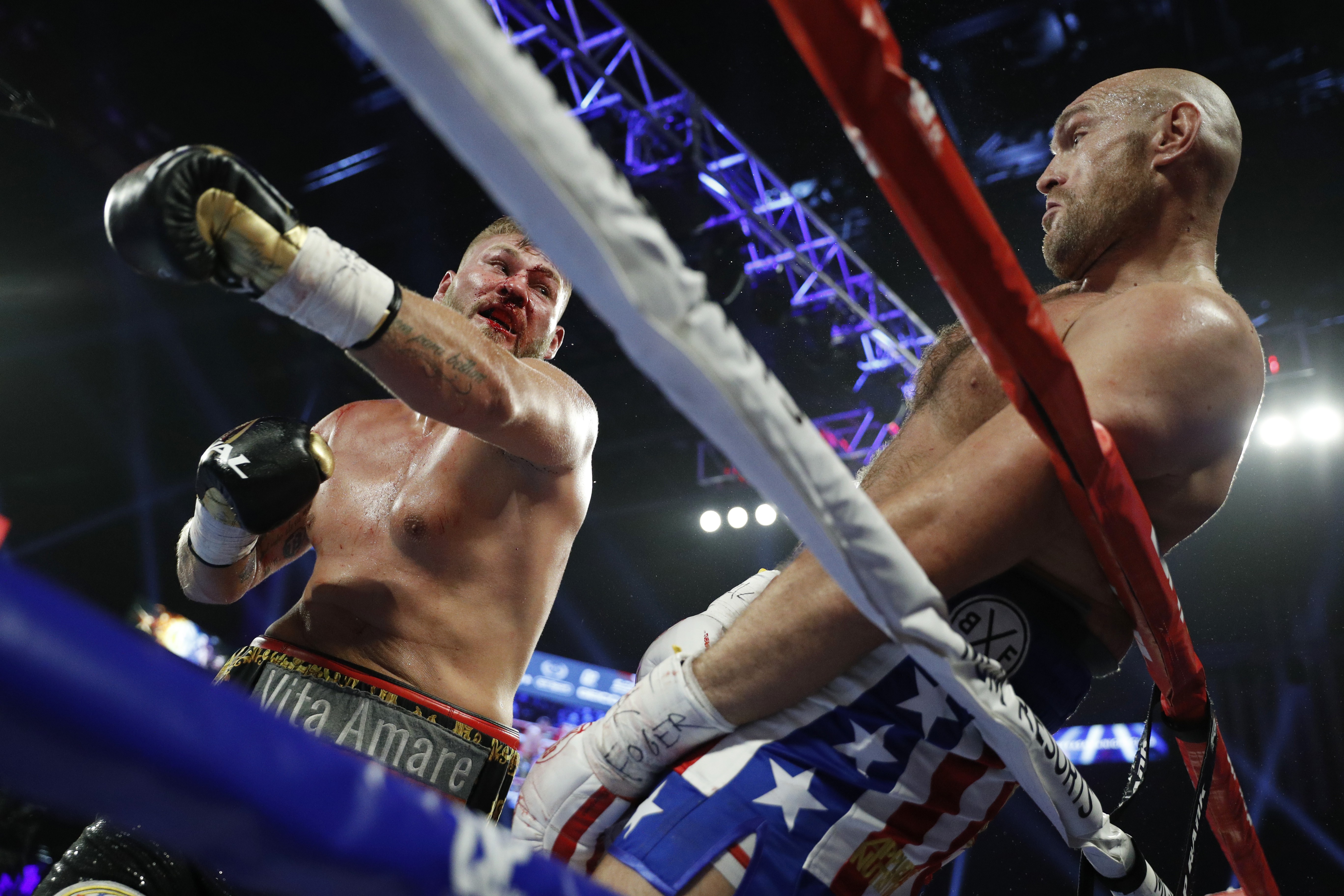 Tyson Fury dodges a punch from Tom Schwarz. Photo: AP