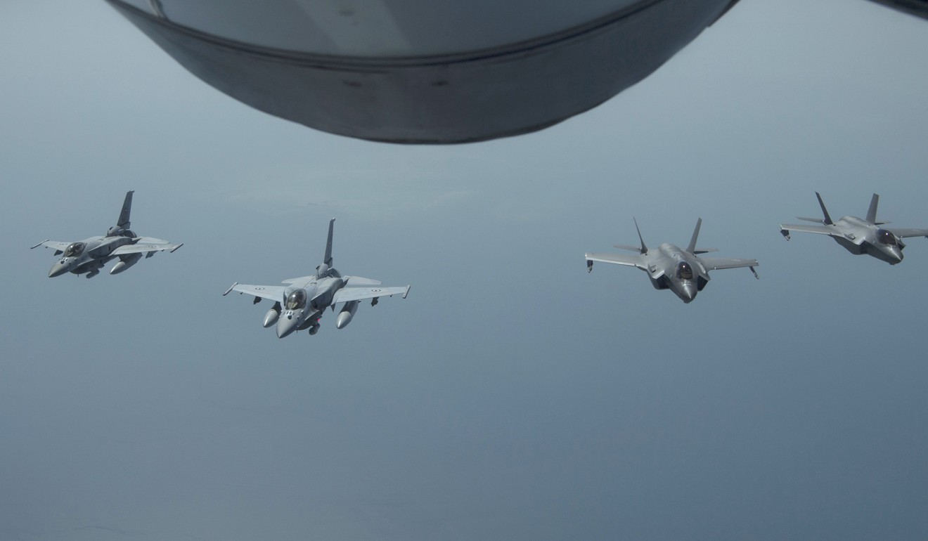 UAE Air Force Desert Falcons fly in formation with US F-35A Lightning IIs somewhere in Southwest Asia in May. Photo: AP