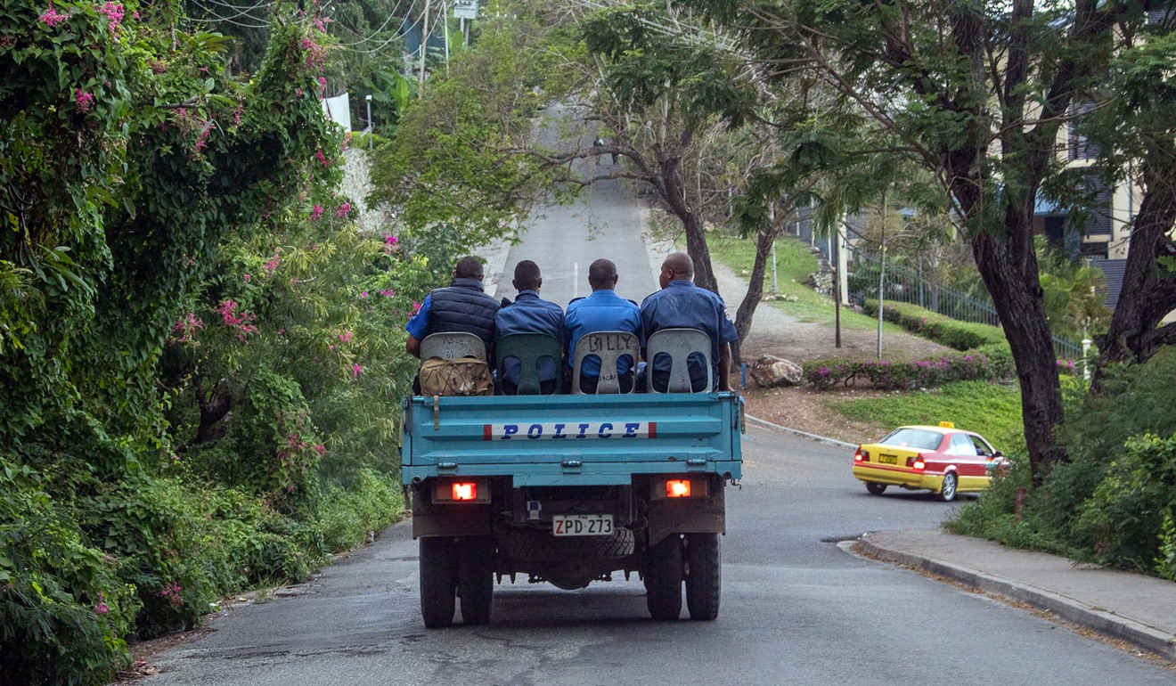 Police patrol the streets of Port Moresby. Photo: AFP