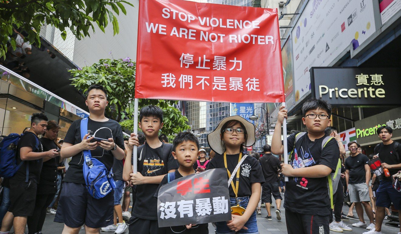 Some youthful demonstrators make their feelings known in Causeway Bay. Photo: Winson Wong