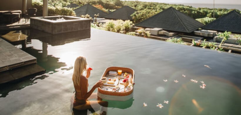 A luxury breakfast – floating on a tray in your own private pool as you enjoy stunning views – makes the ultimate Instagram indulgence. Photo: Shutterstock