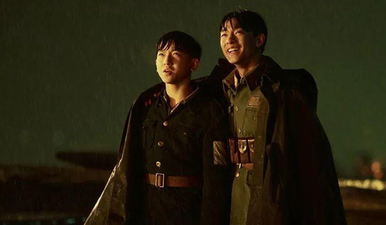 Zhang Junyi (left) and Zhang Youhao in a still from The Eight Hundred.