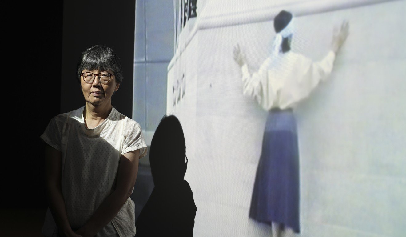 May Fung Mei-wah and her work, She Said Why Me (1989). Part of the Five Artists: Sites Encountered exhibition at the M+ Pavilion. Photo: Xiaomei Chen