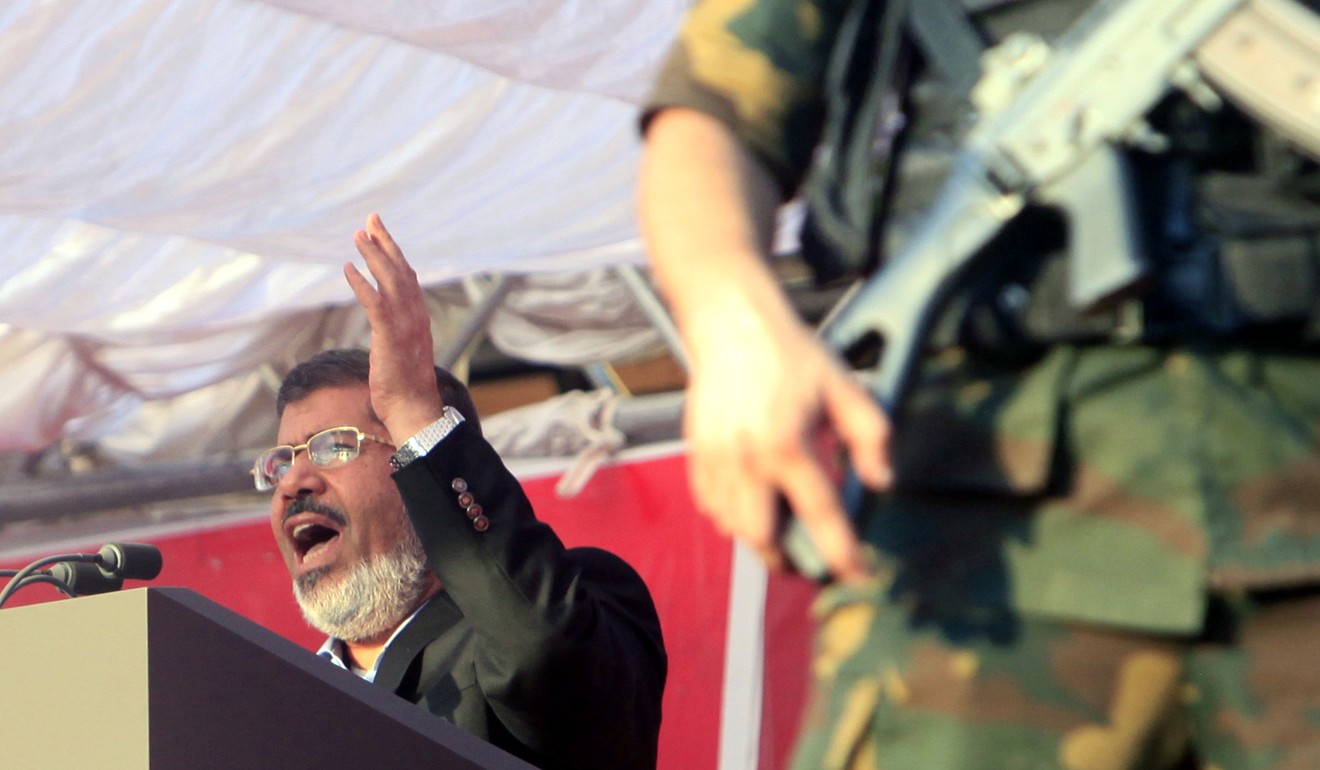 Mohammed Mursi, then president-elect, delivers a speech in 2012. File photo: EPA