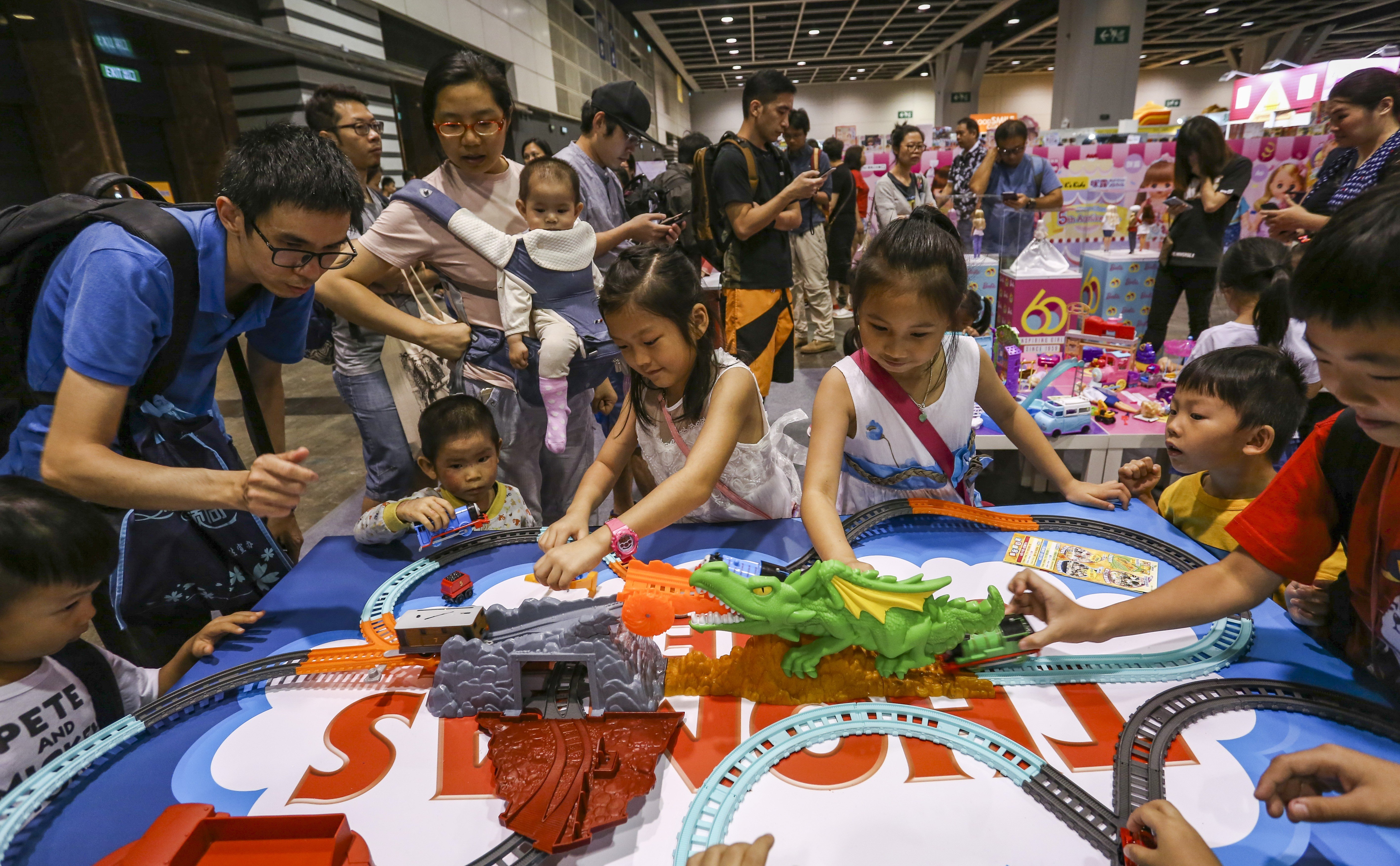 Children play at the Hong Kong Toy Festival in Wan Chai on June 16. The spirited nature of Hongkongers is essential to the city’s economic survival. Photo: Jonathan Wong
