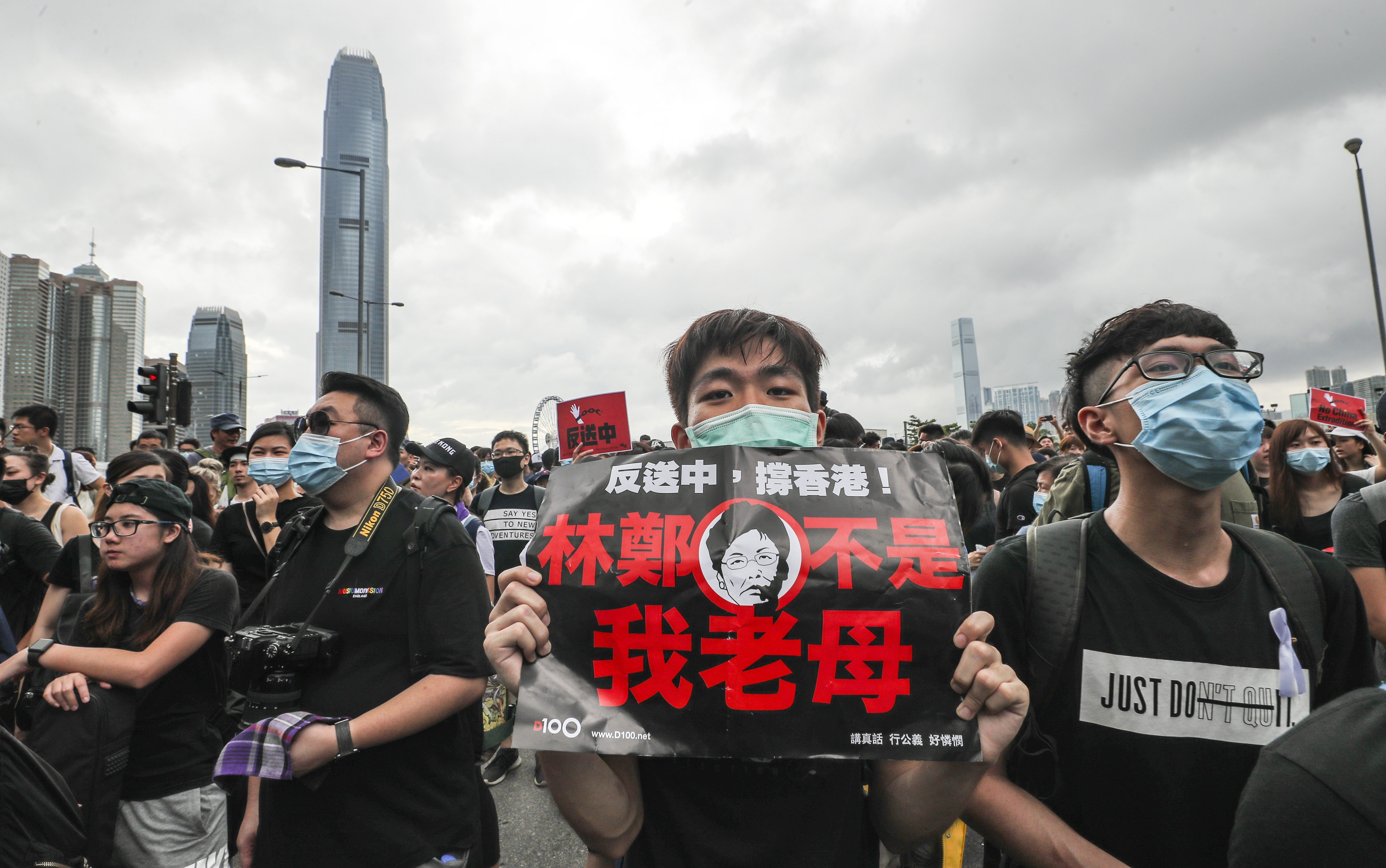 Protesters outside government headquarters in Tamar call for the withdrawal of the extradition bill and city leader Carrie Lam to resign. Photo: Sam Tsang