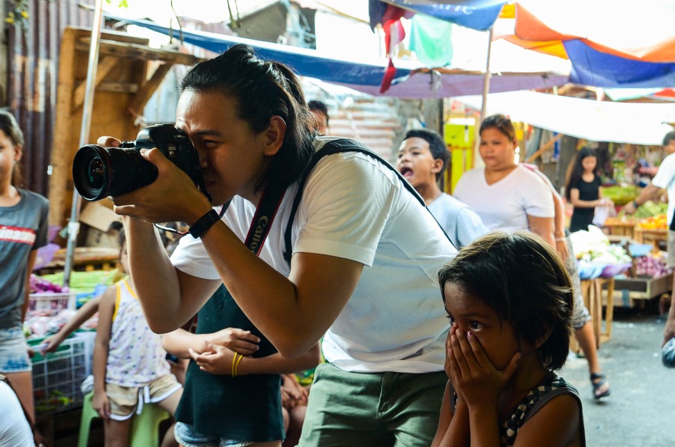 For Jilson Tiu, a Filipino photojournalist, working in photography is no piece of cake. It requires hard work and patience, especially for those times when projects are hard to come by. Photo: Maro Enriquez