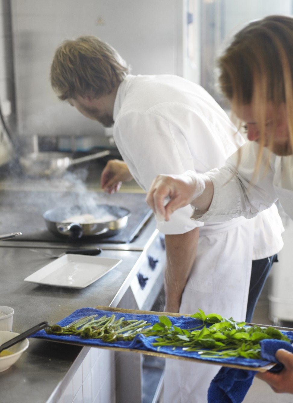 Chefs at work in the kitchen of two-Michelin-star Faviken Magasinet in Jarpen, Sweden.