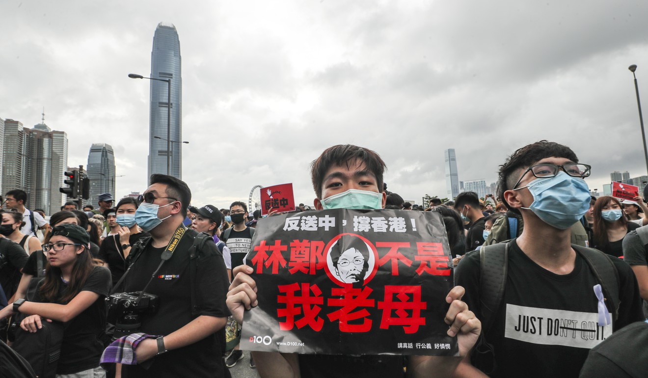 Protesters outside government headquarters in Tamar on June 17. Photo: Sam Tsang