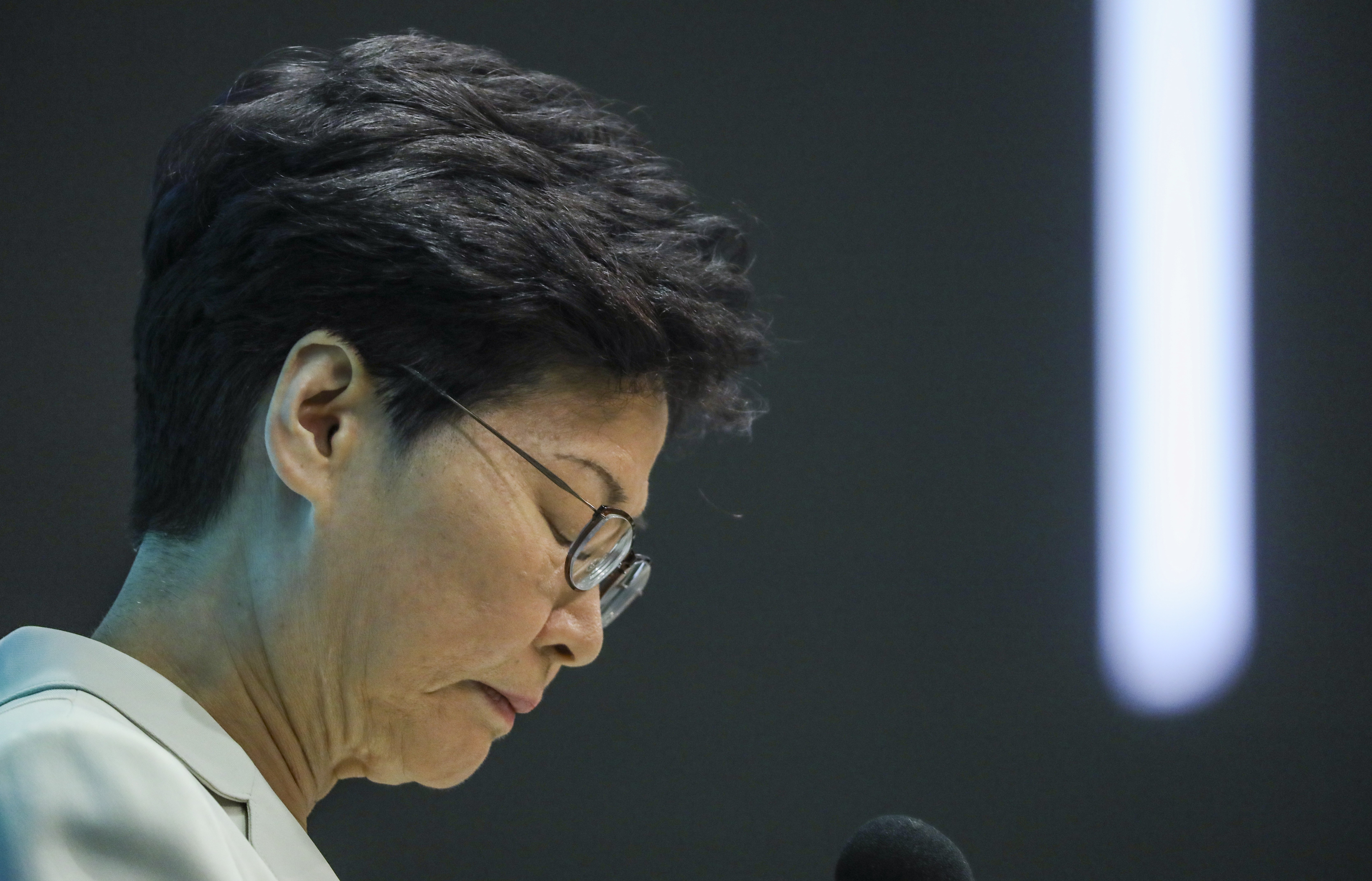 Carrie Lam says sorry, but stops short of bowing, as one of her predecessors did in 2012. Photo: Sam Tsang