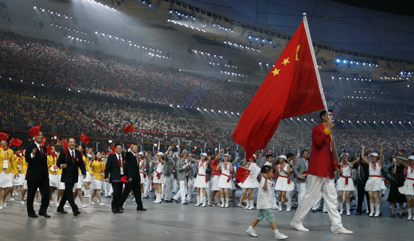 Yao Ming carries the China flag during the opening ceremony of the Beijing 2008 Olympic Games. Photo: Reuters