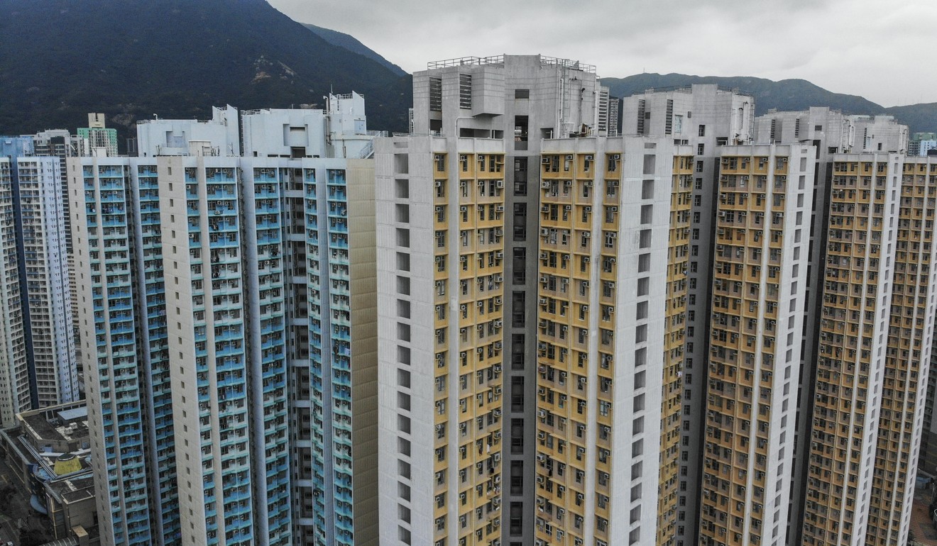 Oi Tung Estate (left), a public housing estate, stands next to Tung Yuk Court, a Home Ownership Scheme estate in Shau Kei Wan. The average waiting time for public housing is 5½ years. Photo: Martin Chan