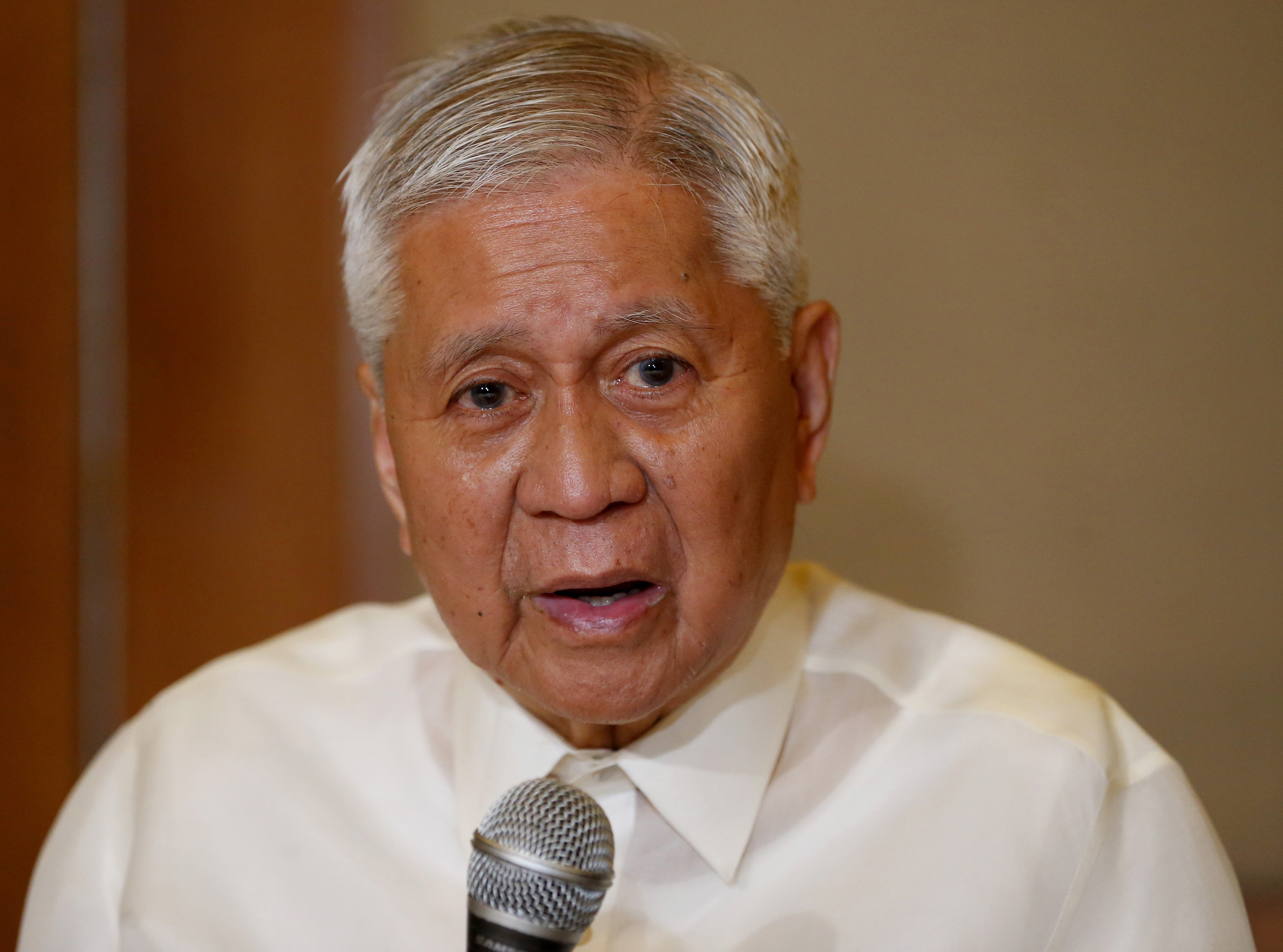 Frosty reception: the former foreign secretary of the Philippines Albert del Rosario arrived in Hong Kong on Friday. Photo: AP