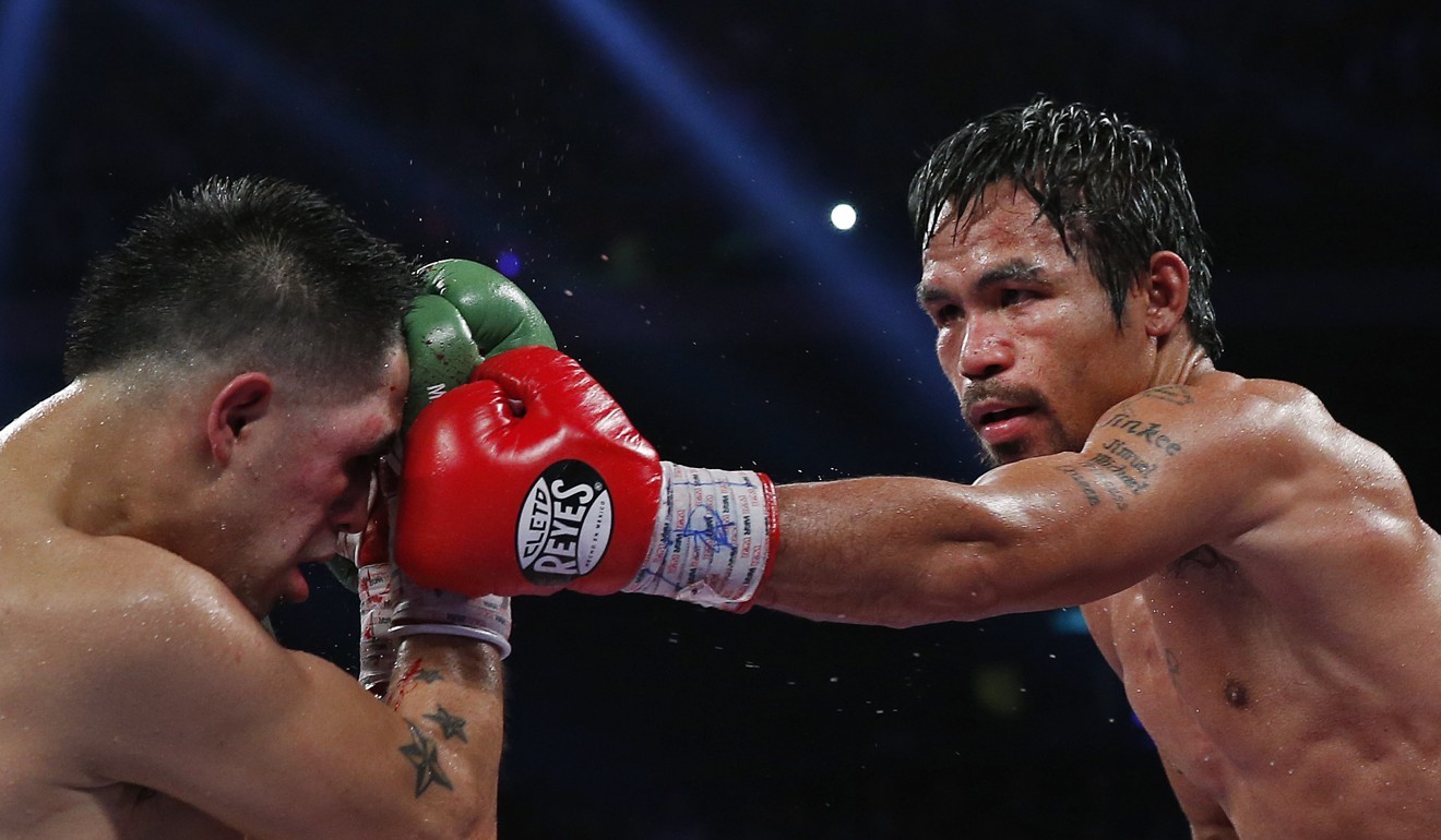 Manny Pacquiao lands a left to the head of Brandon Rios. Photo: AP