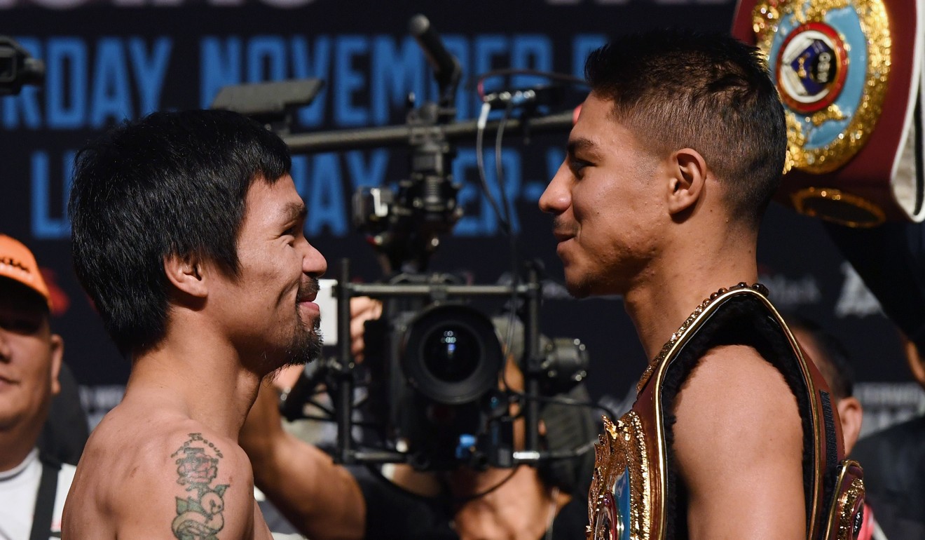 Manny Pacquiao and Jessie Vargas face off during their official weigh-in in 2016. Photo: AFP