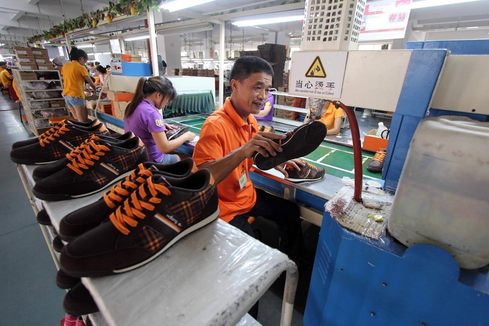 Labourers at a shoe factory in Jinjiang on September 17, 2013. Photo: AFP