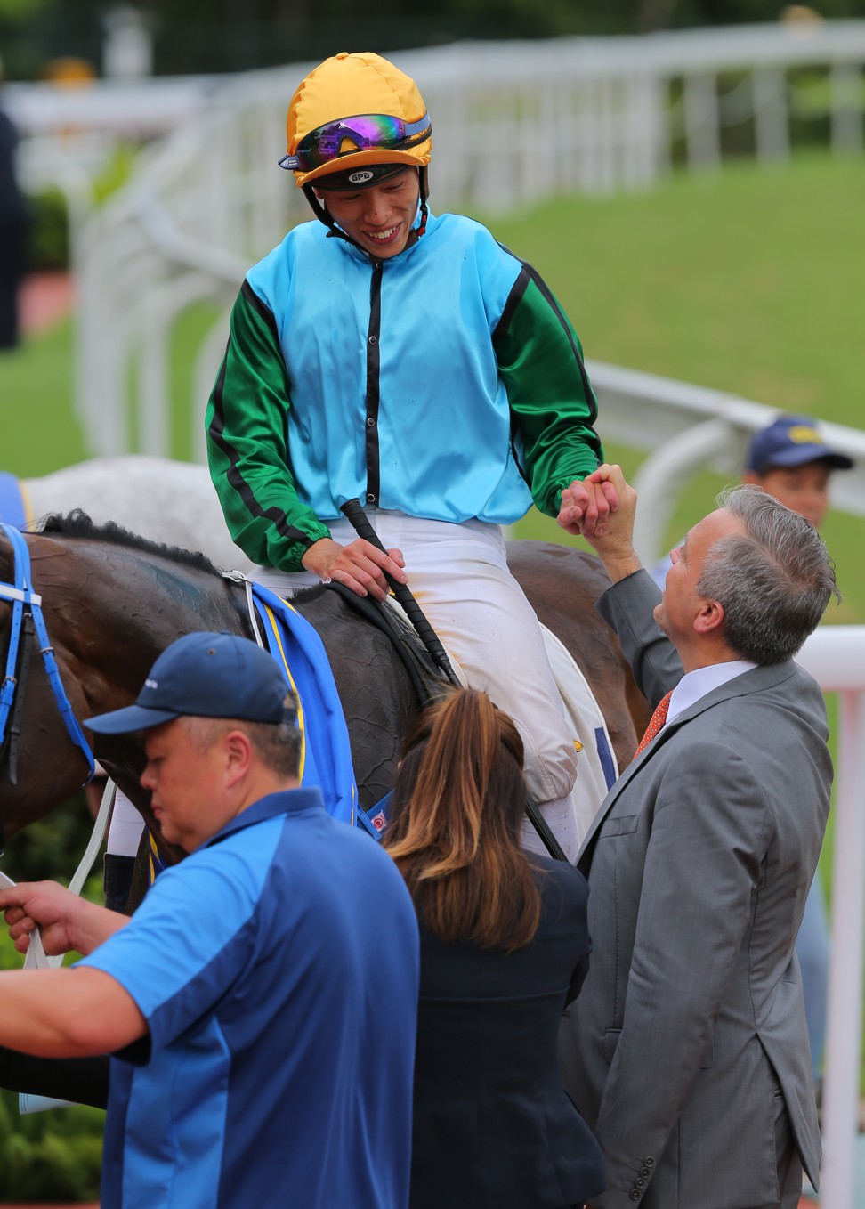 Caspar Fownes shakes Vincent Ho’s hand after Rise High’s win.