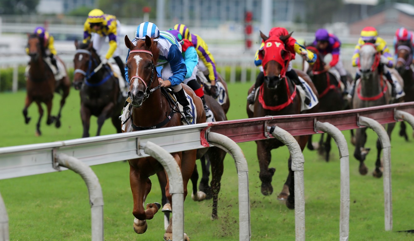 Voyage Warrior races down the outside rail to win easily at Sha Tin on Sunday.