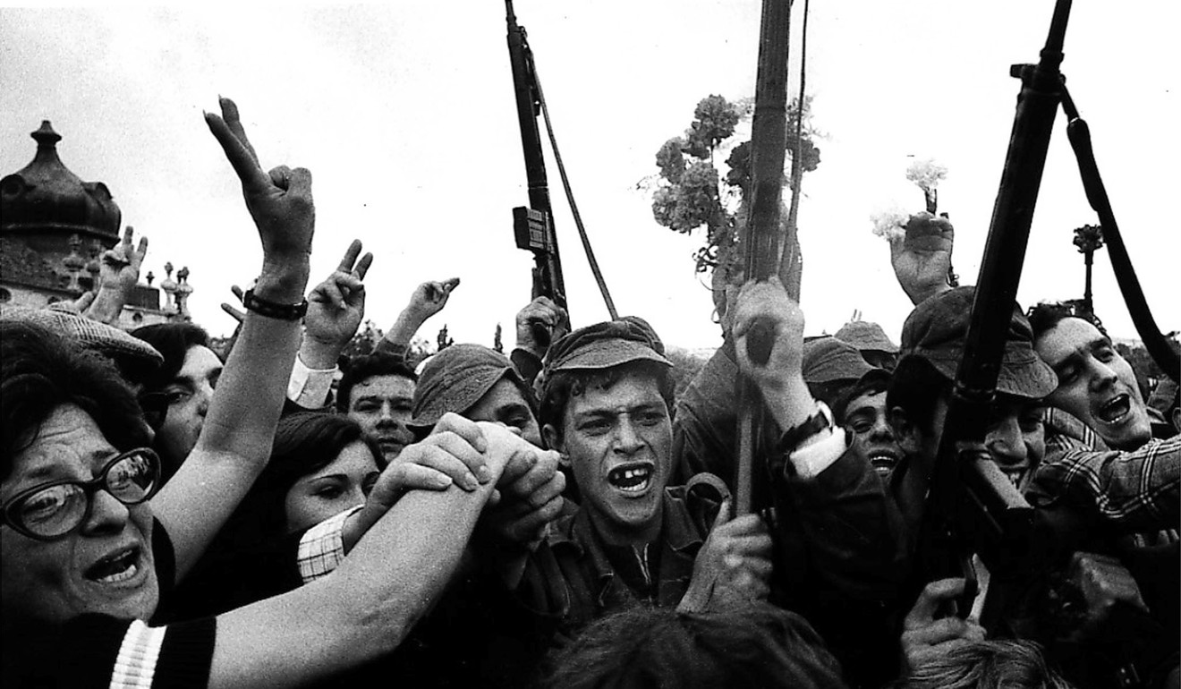 Soldiers and civilians celebrate the victory of the Carnation Revolution in Portugal on April 25, 1974. Photo: Reuters