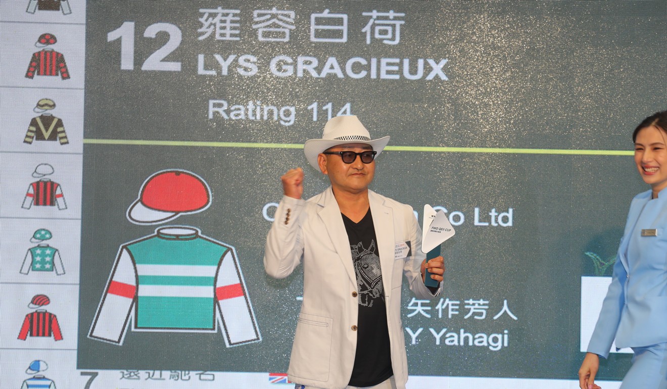 Trainer Yoshito Yahagi draws the Barrier 4 for The QEII Cup runner Lys Gracieux in the Champions Day Barrier Draw at Sha Tin.