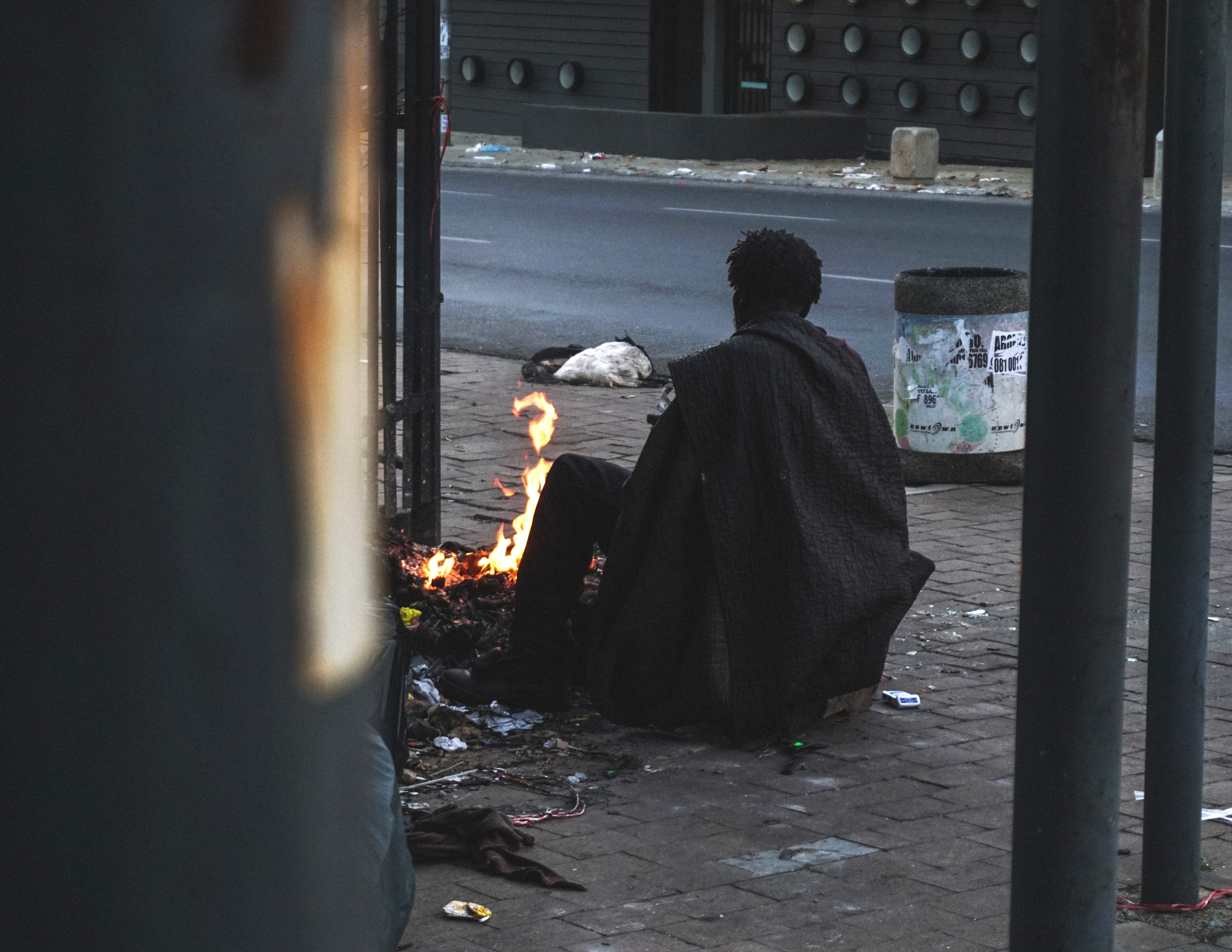 A homeless man on a pavement in Johannesburg. Photo: Shutterstock