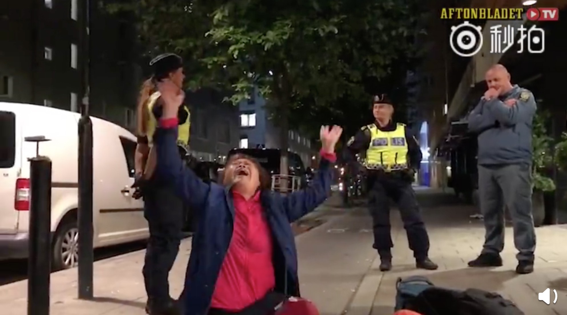 A Chinese tourist drops to the ground outside a hotel in Stockholm during an incident in September that prompted 11 critical statements from the embassy. Photo: Handout