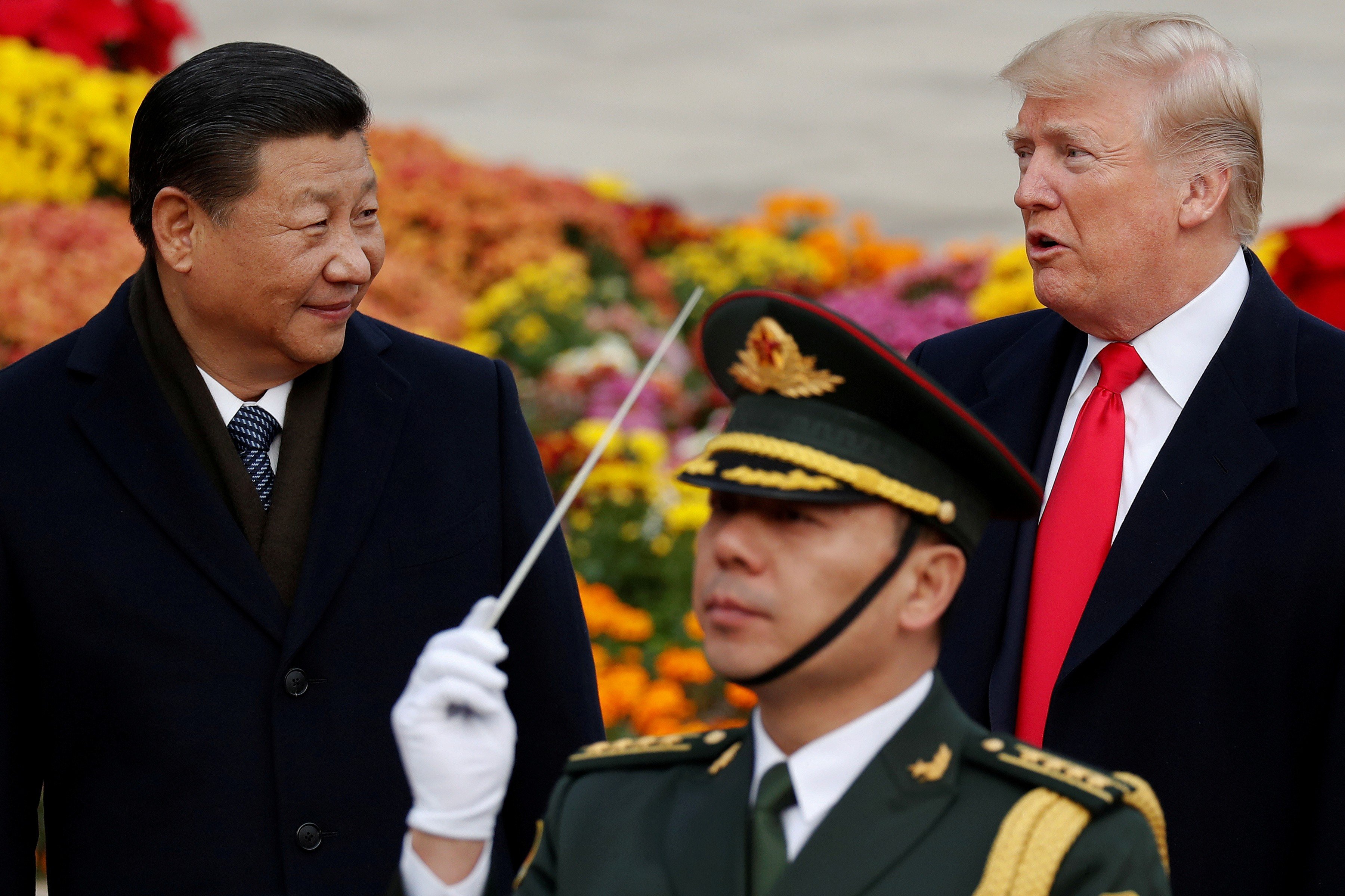 Chinese President Xi Jinping and US President Donald Trump taking part in a welcome ceremony at the Great Hall of the People in Beijing, in 2017. Photo: Reuters