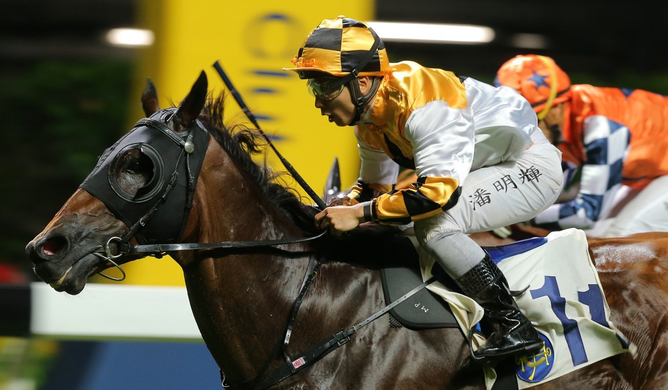 Jockey Matthew Poon completes a double aboard Flying Quest.