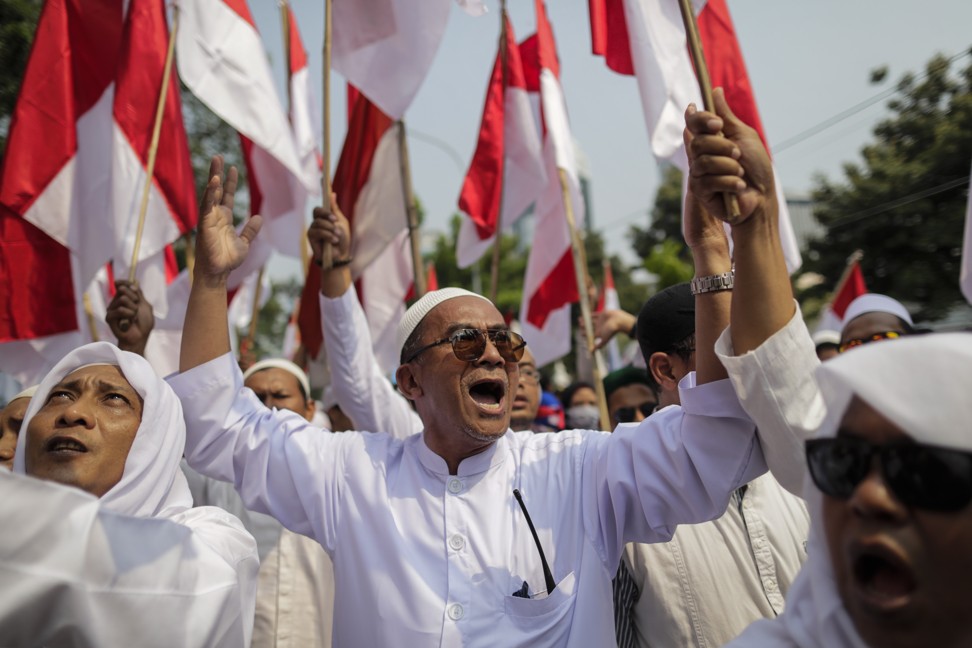 Supporters of Prabowo Subianto shout slogans during a rally in Jakarta. Photo: EPA-EFE