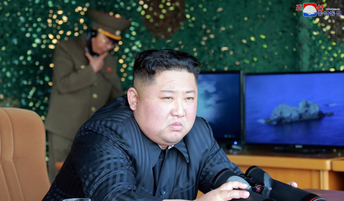 North Korean leader Kim Jong-un observes a weapons test. Observers say foreigners living in North Korea are closely monitored for their social media activity. Photo: AP
