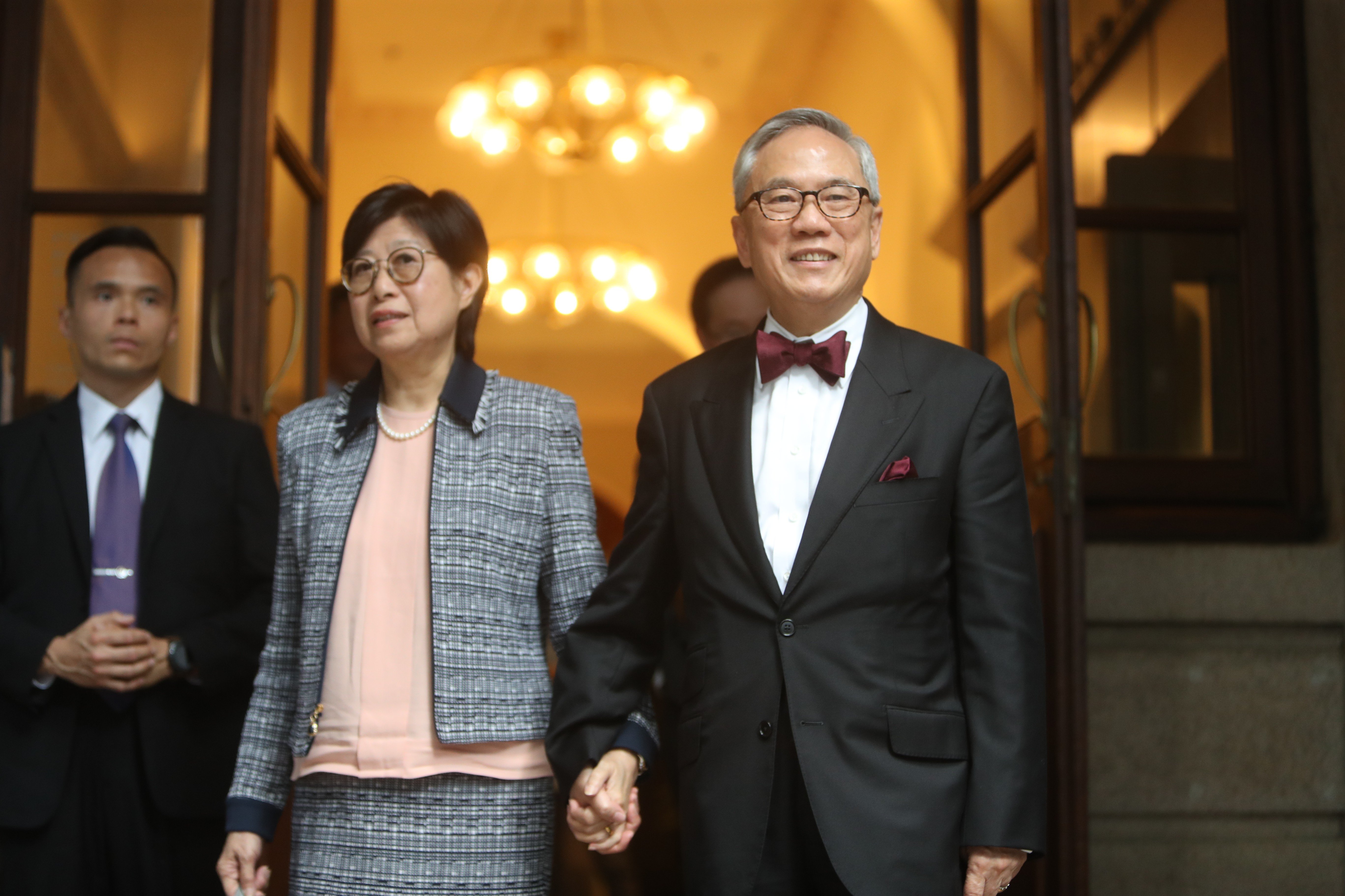 Donald Tsang and his wife Selina (right) leave the Court of Final Appeal in May following the conclusion of legal arguments. His conviction has now been quashed. Photo: Winson Wong