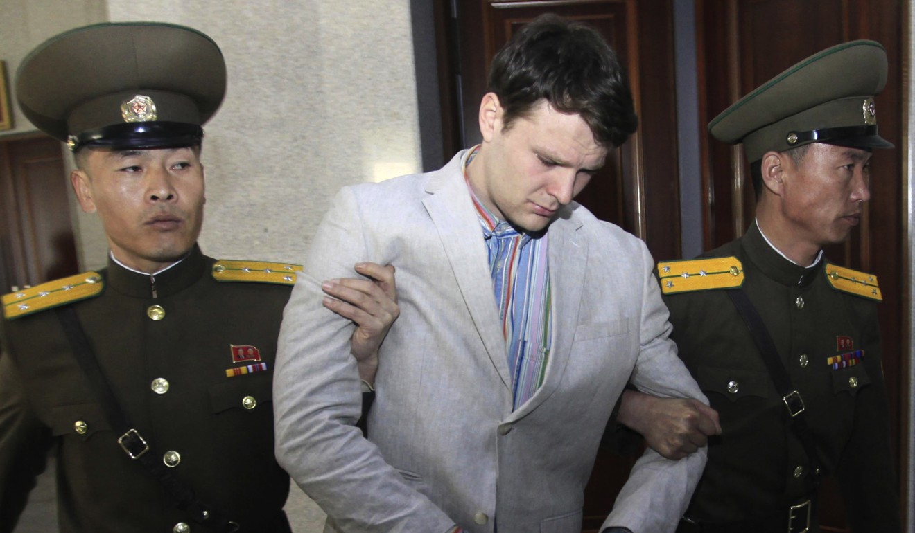 American student Otto Warmbier escorted at the Supreme Court in Pyongyang before he was released and eventually died in the US. Photo: AP