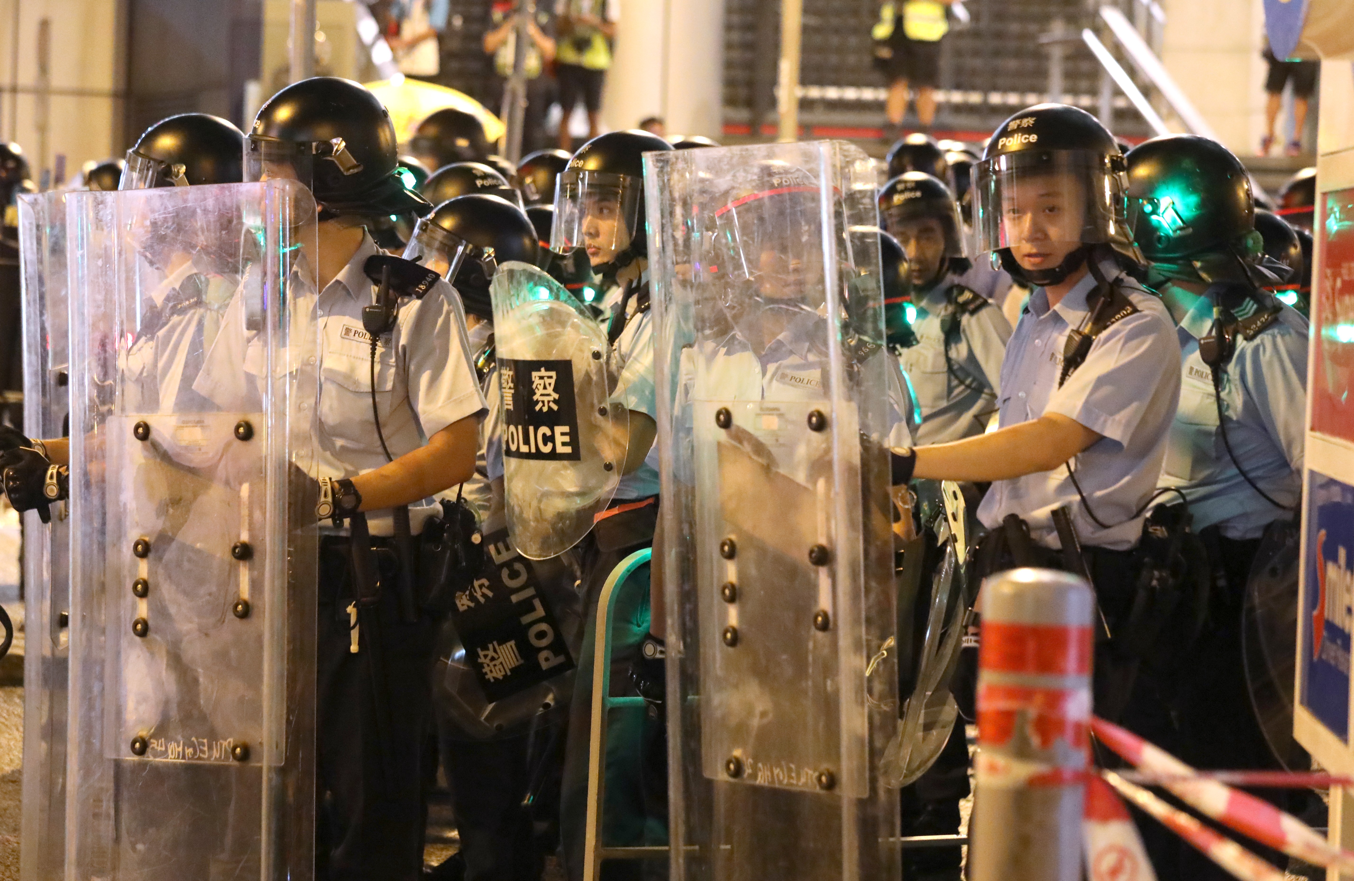 Riot police outside the force’s headquarters in Wan Chai on Wednesday night. Photo: Dickson Lee