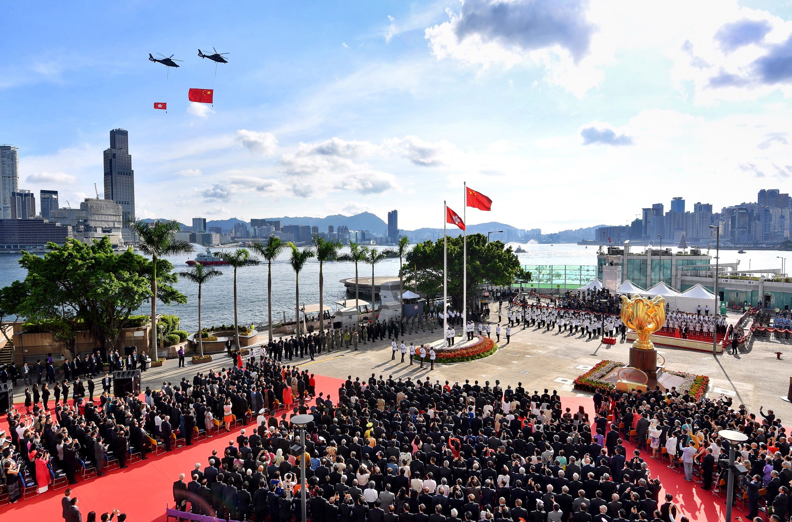 The Hong Kong government says thunderstorms could force the July 1 ceremony indoors, in contrast to the 20th anniversary event, which was basked in sunshine. Photo: AFP / Information Services Department