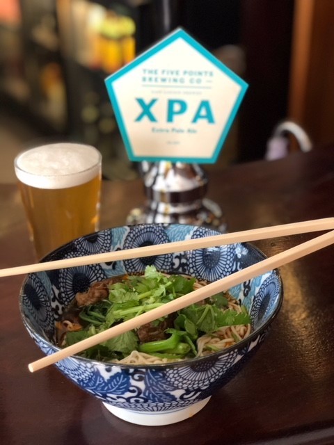 Liu Xiaomian noodles and beer. Photo: HANDOUT [FEATURES 2019]