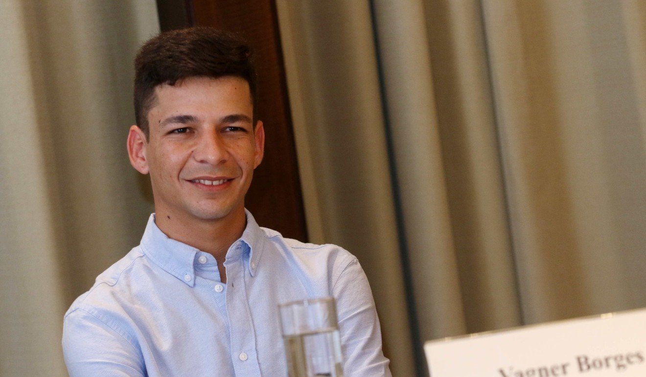 Jockey Vagner Borges answers questions from the press at Sha Tin on Friday.