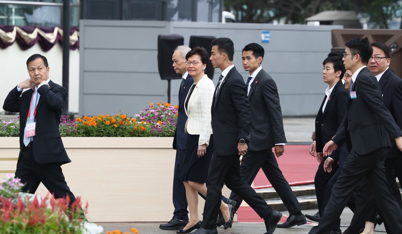 Chief Executive Carrie Lam arrives at the Hong Kong Convention and Exhibition Centre ahead of the flag-raising ceremony. Photo: Nora Tam