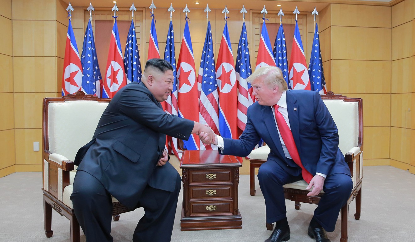 President Donald Trump and North Korean leader Kim Jong-un shake hands during a meeting. Photo KCNA via Reuters