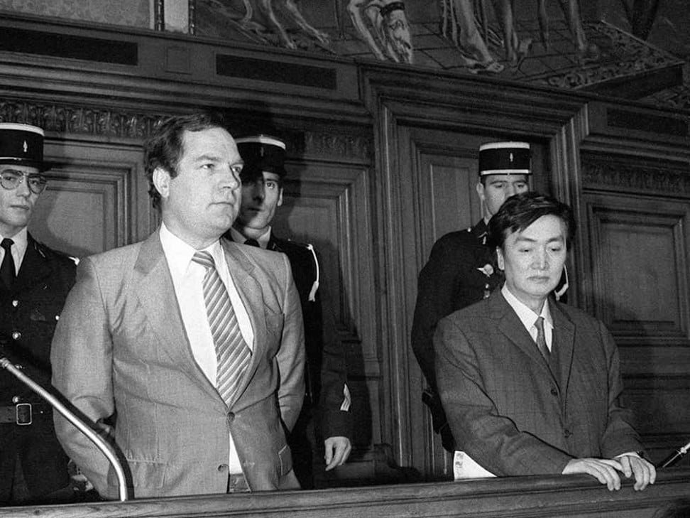Boursicot (left) and Shi stood trial in France in 1983 for spying for China. They were found guilty in 1986 and received six-year sentences for espionage. Both were pardoned in 1987.