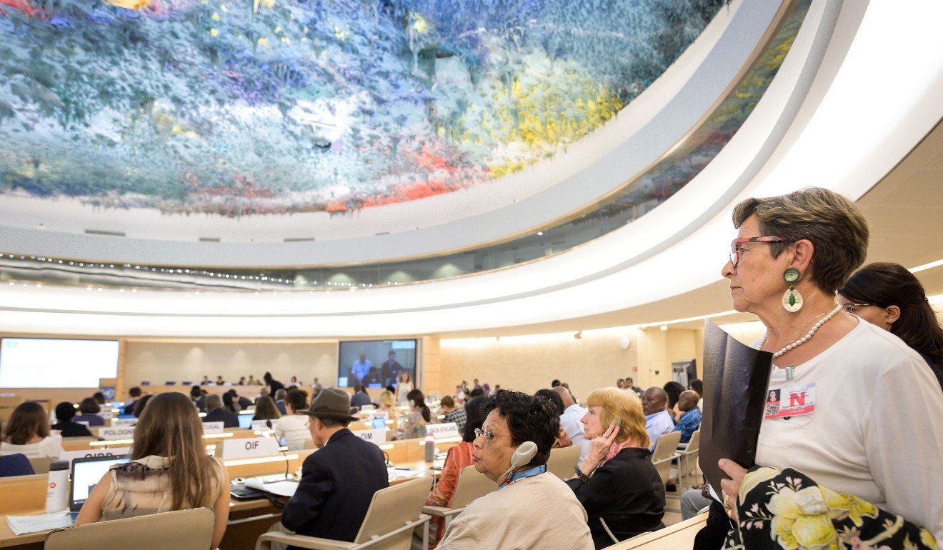 Viviane Lambert (right), Vincent Lambert's mother, looks on before she addresses the UN Human Rights Council in Geneva on Monday. Photo: AFP