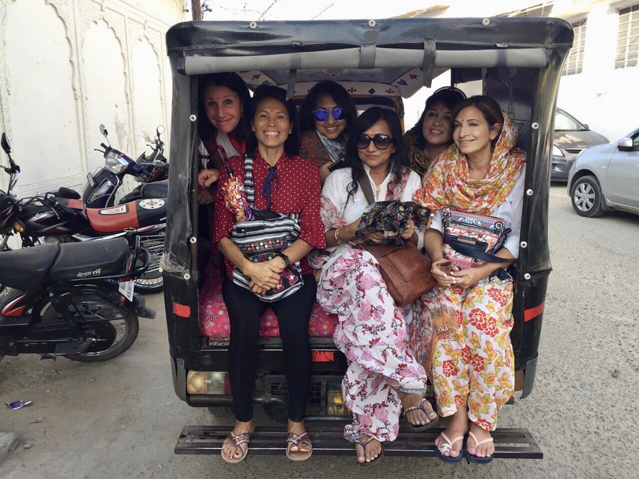 Tourists pile into an auto rickshaw in India during a women-only tour, organised by Tours n Detours. Photo: courtesy of Tours n Detours