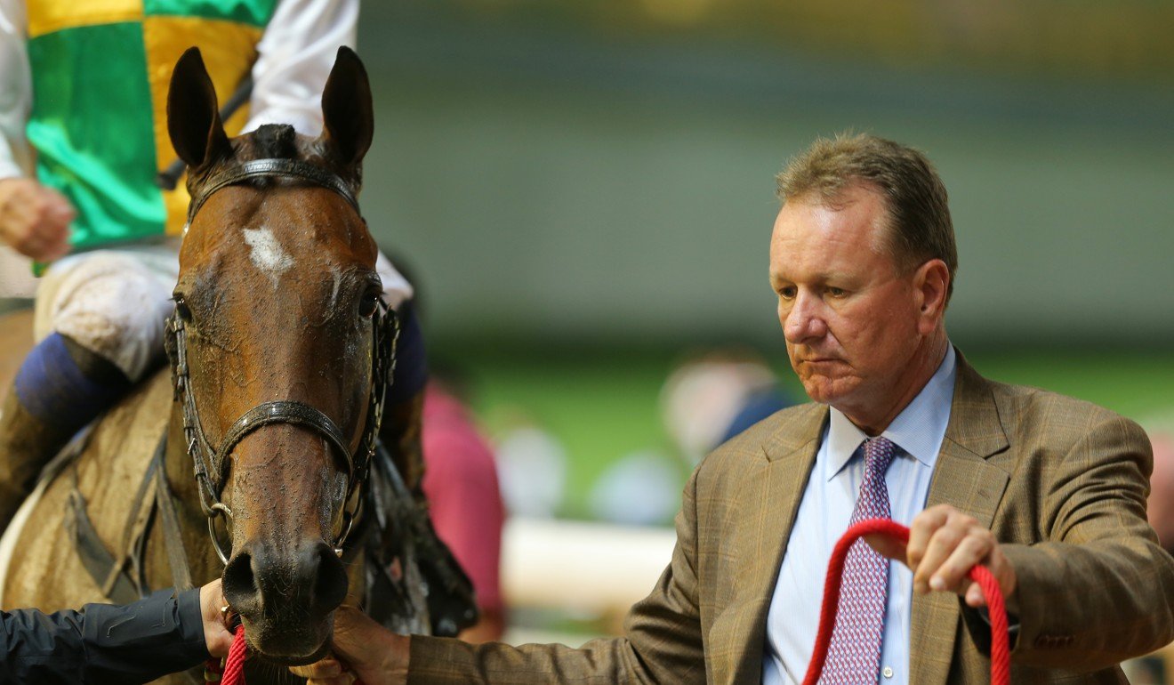 Tony Millard leads Sparkling Dragon into the winners enclosure at Happy Valley on Wednesday night.