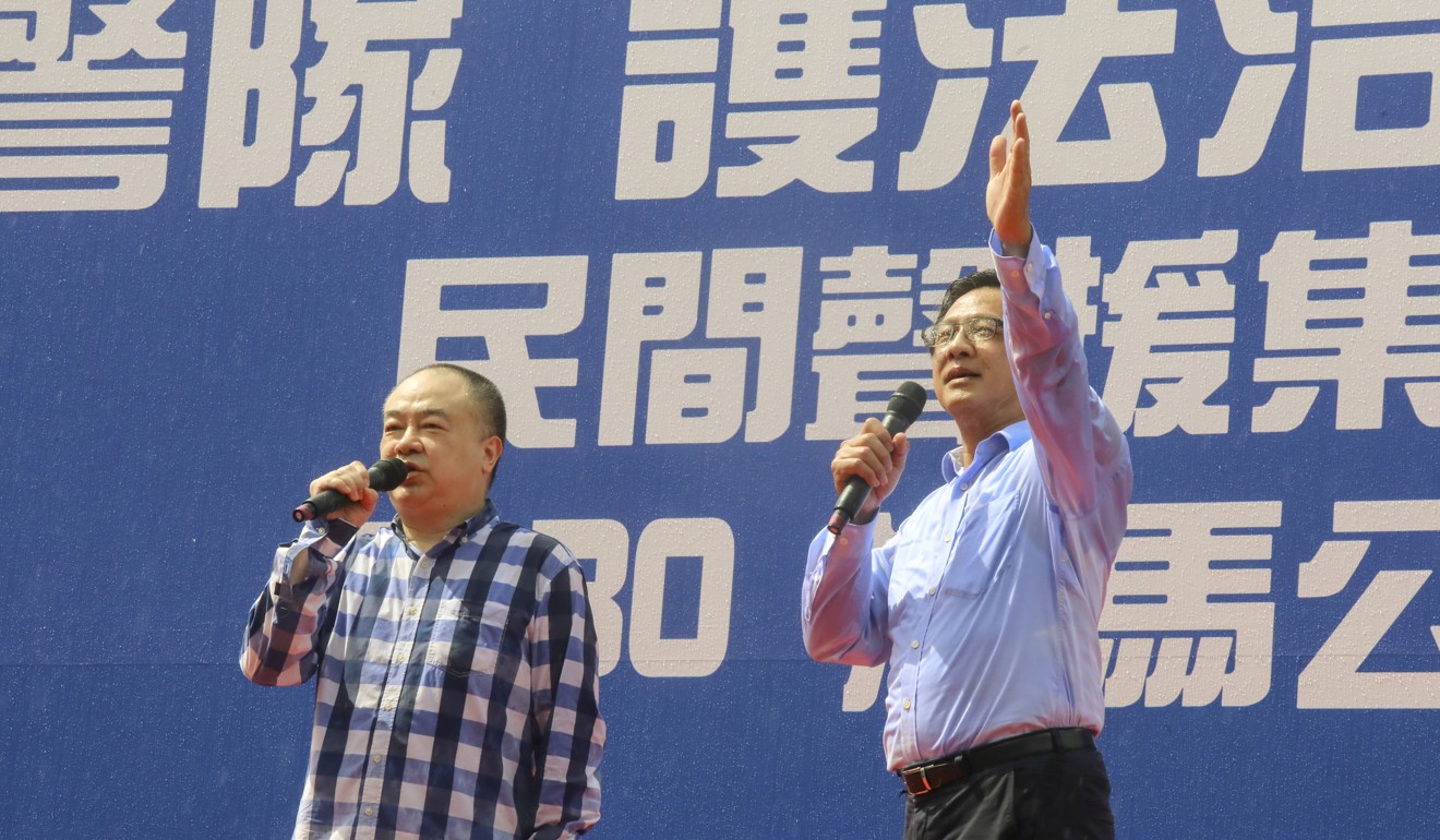 Film director Clifton Ko and lawmaker Junius Ho address the crowd at the rally in Tamar. Photo: K.Y. Cheng
